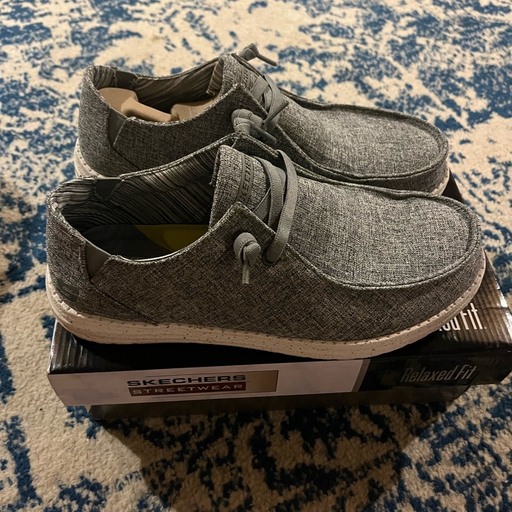 Sketchers Men’s 10.5 New Slip Ons